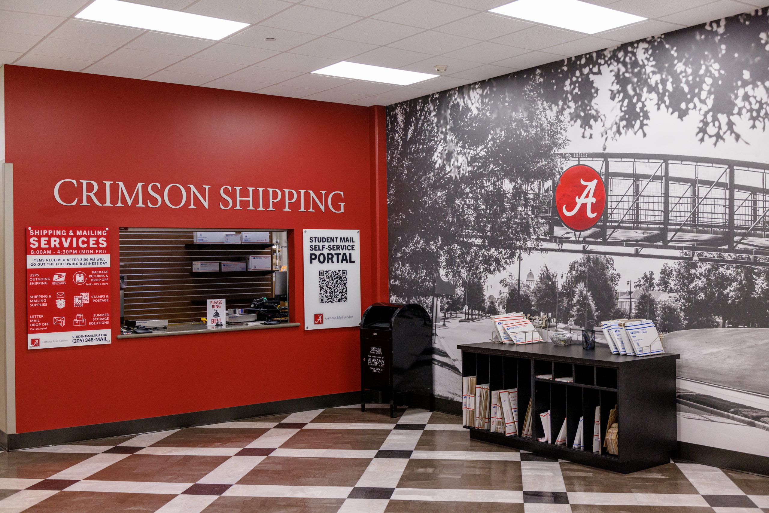 crimson shipping counter at the Student Mail Center