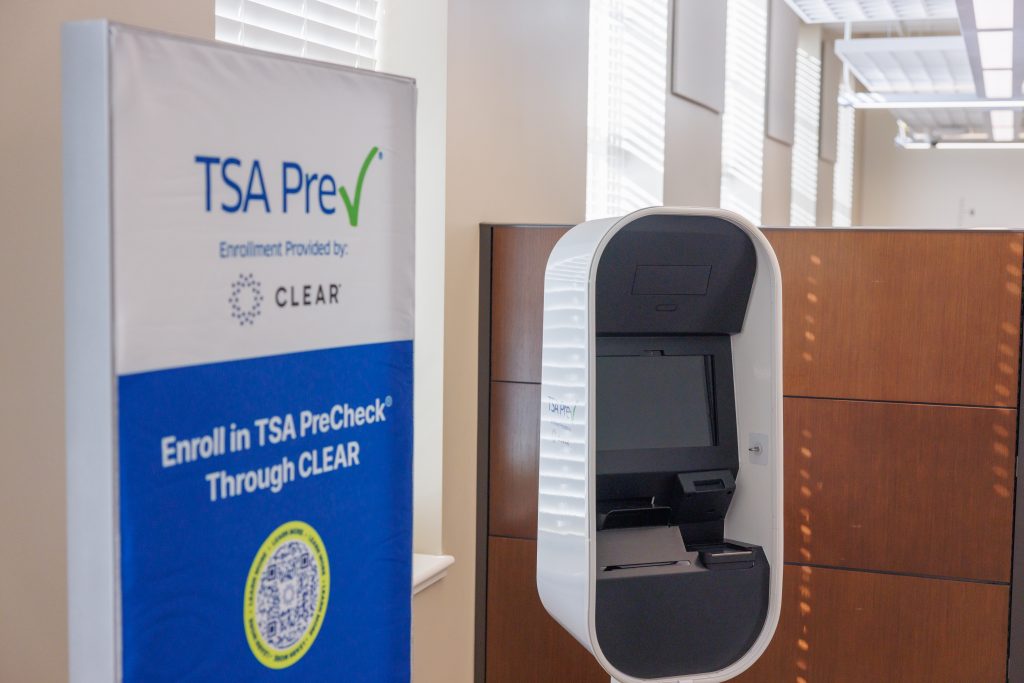 TSA PreCheck pod and banner in the UA Passport Acceptance Facility.